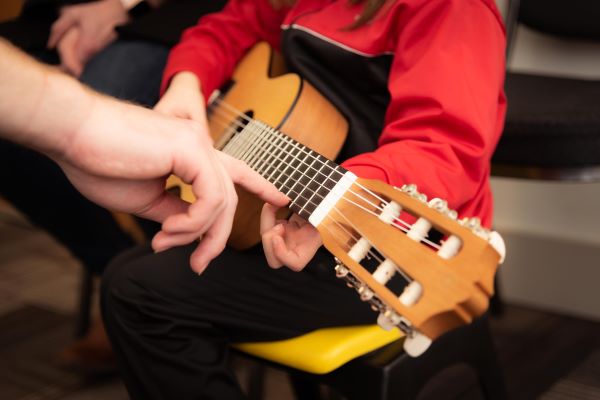 Guitar Lessons | East West Music & Dance